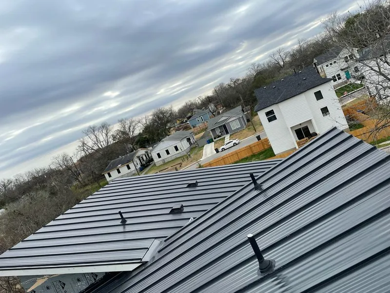 Standing seam metal roof panels with vents for Skylight Repair in Smithtown